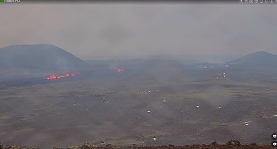 The eruption fissure as it was at 11:00 today. To the right of the image is Mt. Stóra-Skógafell, and to the left is Mt. Sýlingarfell. The most active part of the fissure is east of Sýlingarfell, with smaller openings to the north.